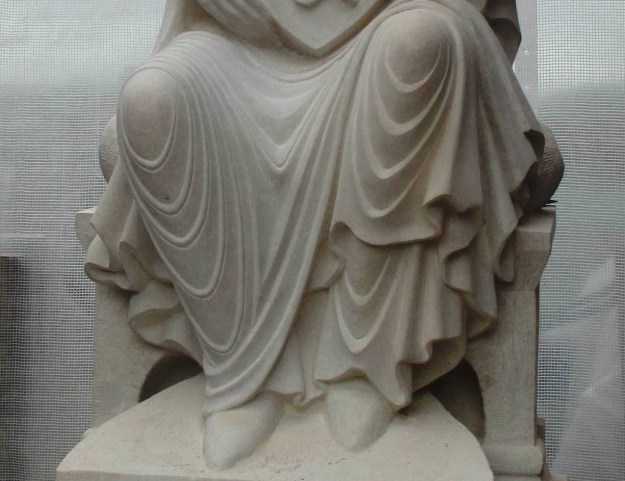 Romanesque style folds of her garments 