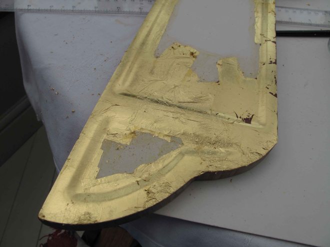 gilding a door to the icon triptych