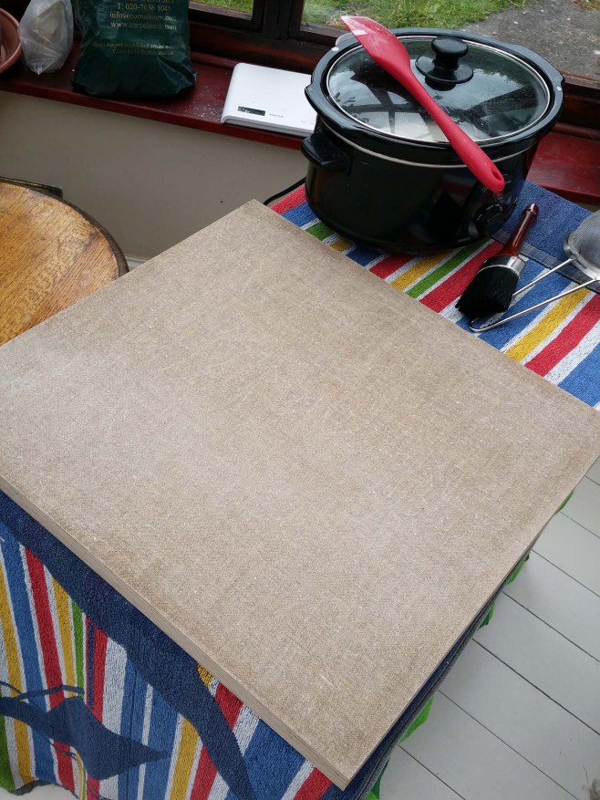 preparation of gessoing board.