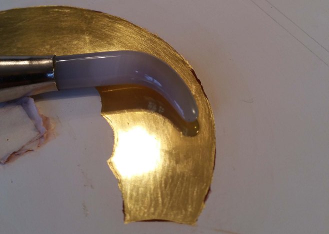 dog tooth burnisher on water gilding
