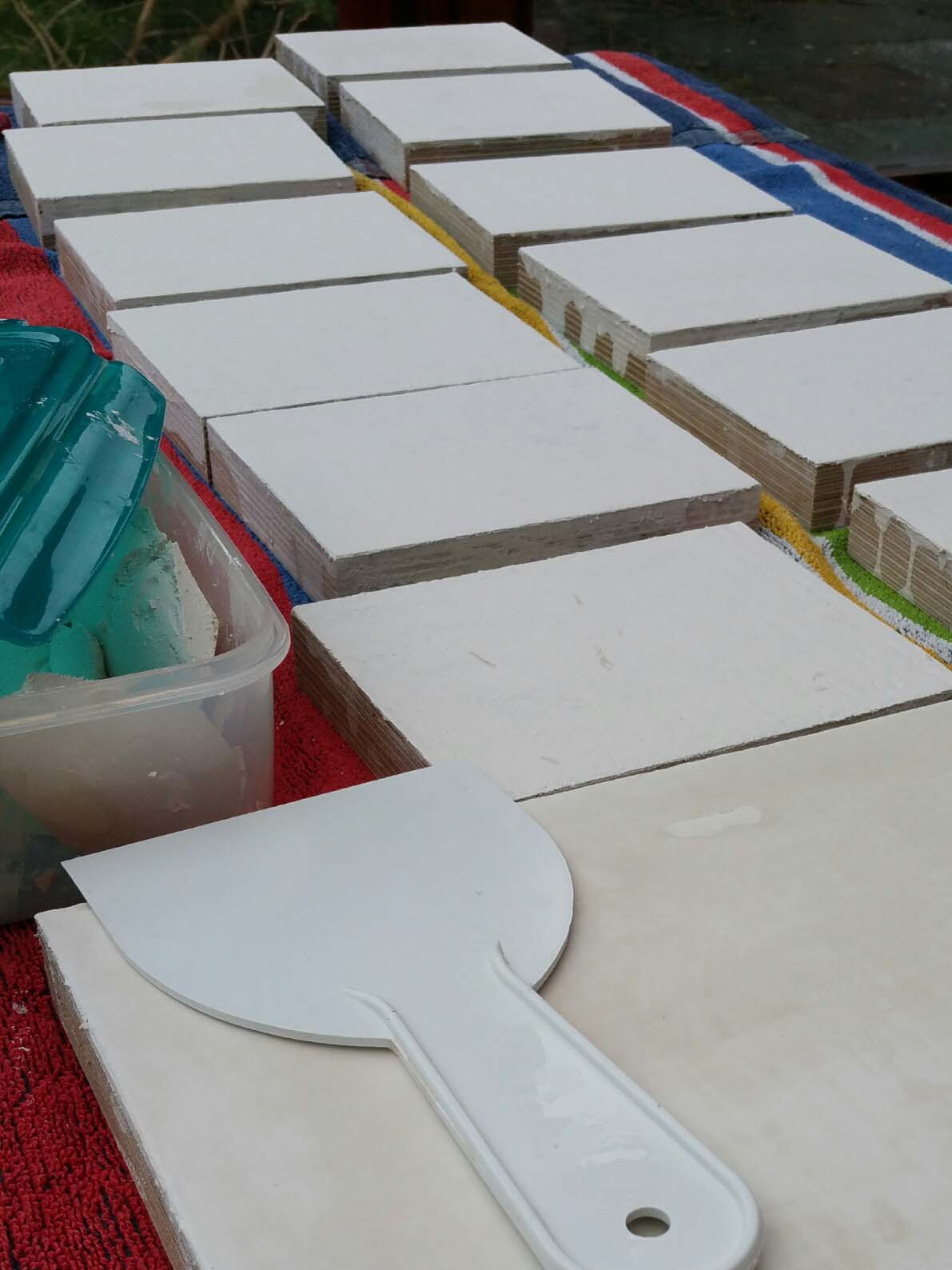 icon boards laid out to gesso