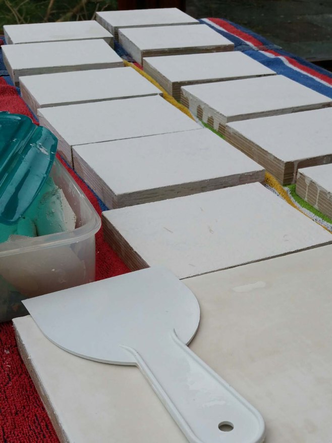 icon boards laid out to gesso