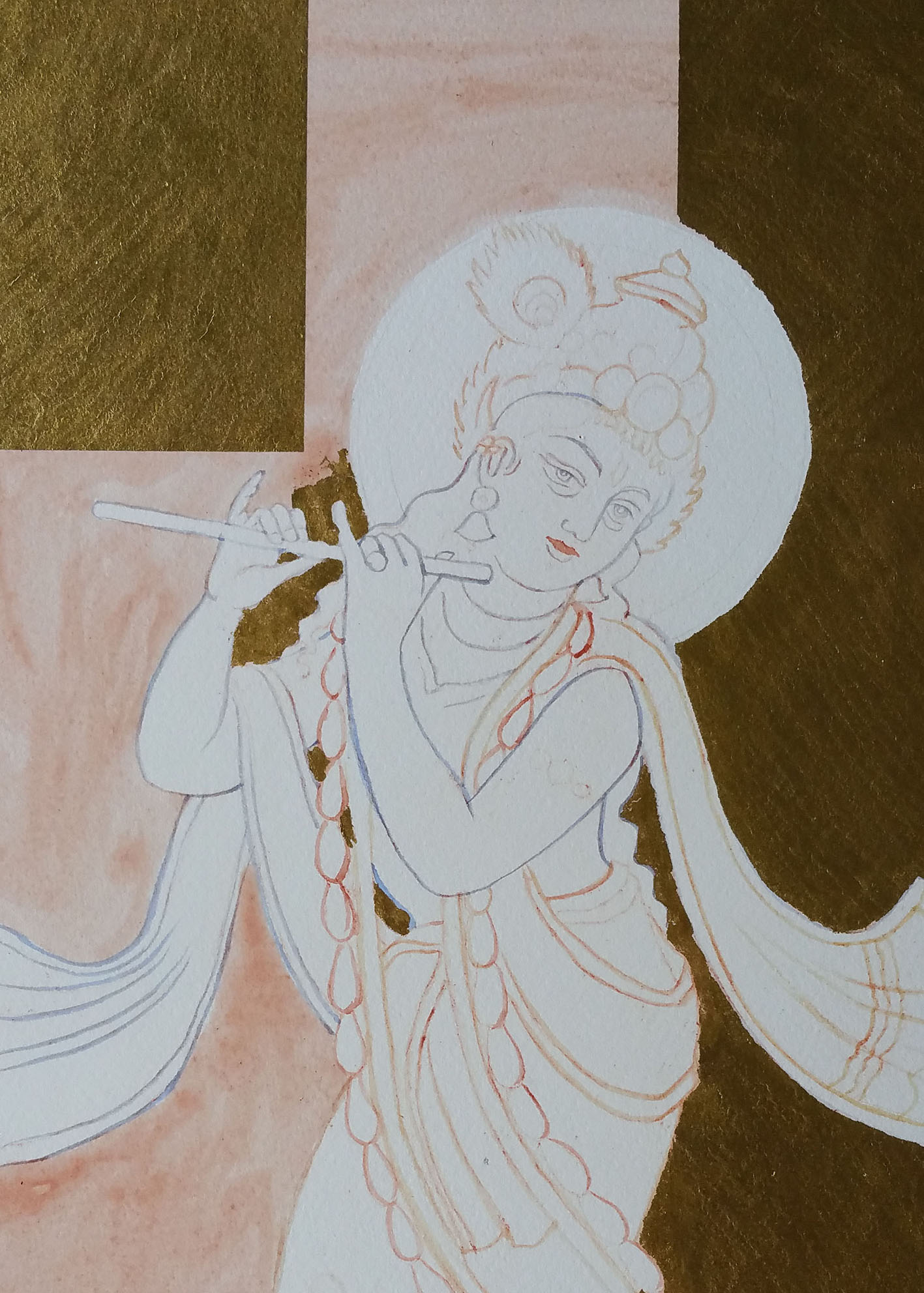gold leaf on lord krishna drawing